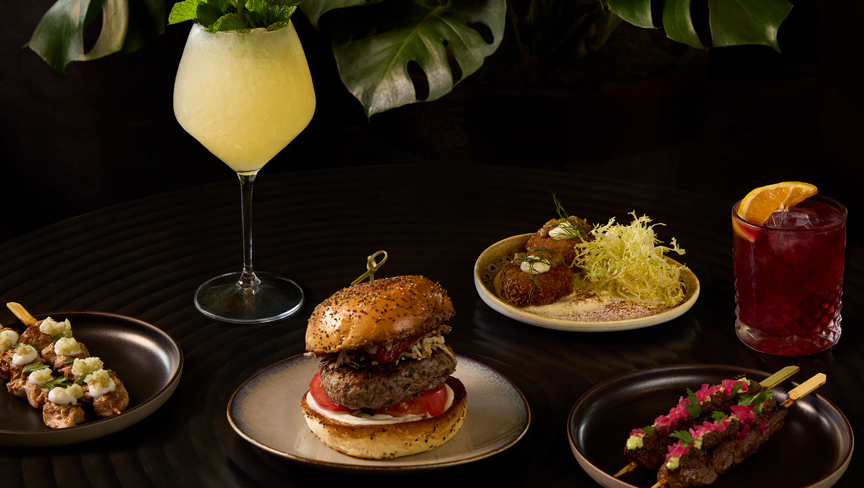 Two garnished No Rose cocktails