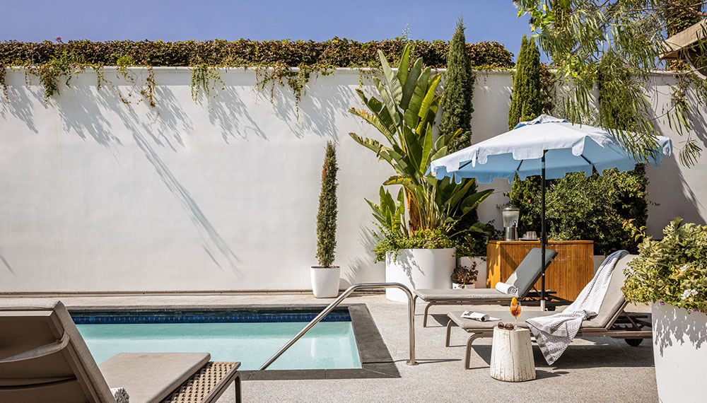 lounge chairs by La Peer outdoor pool